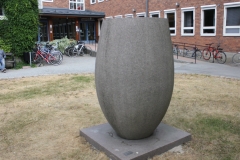 The stone sculpture outside MEB